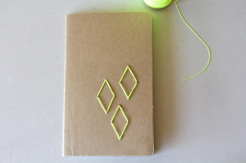 Those plain brown notebooks are perfect for decorating. I love this geometric embroidered one.