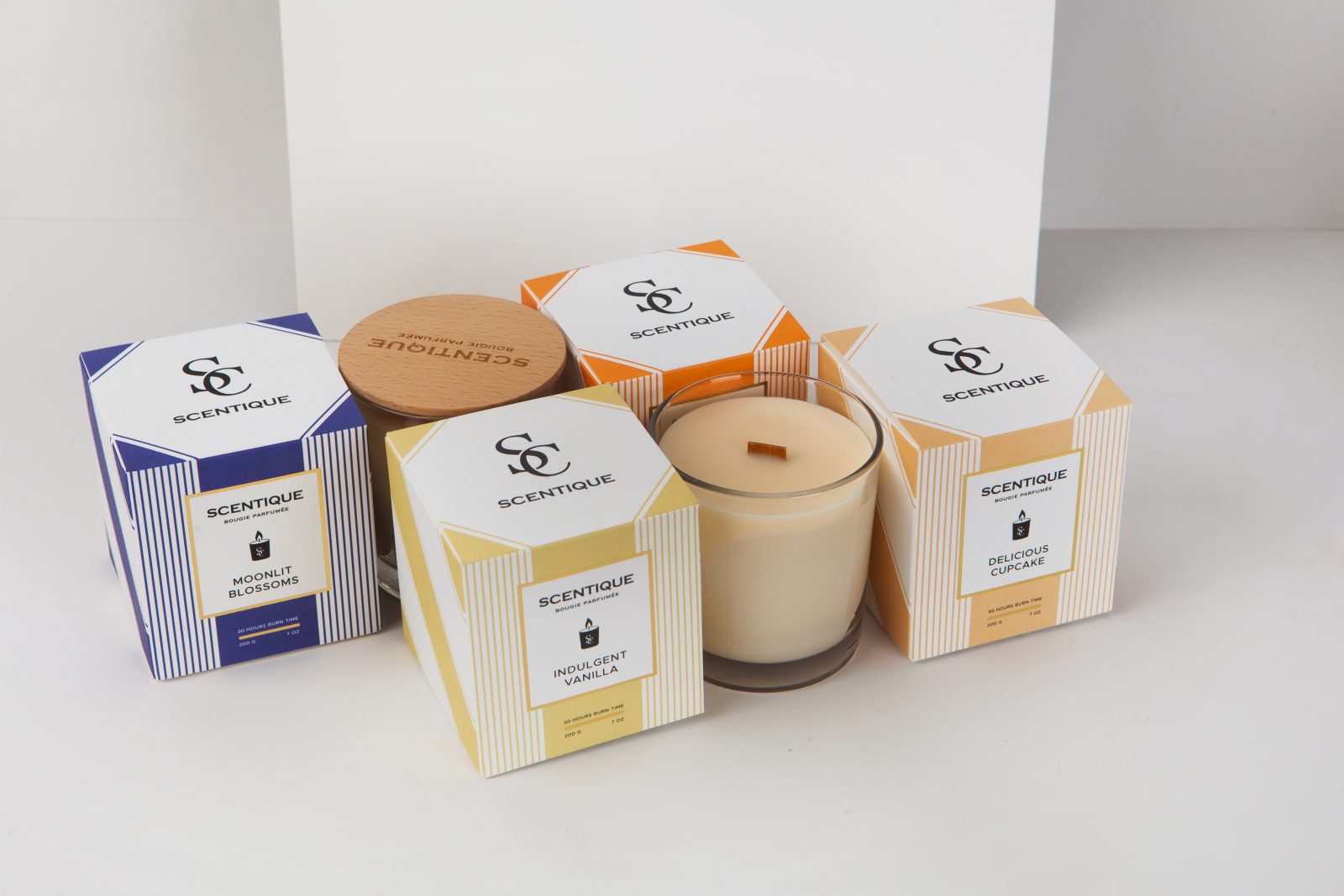 Scentique's Elegant Candle Packaging By The Offset Group