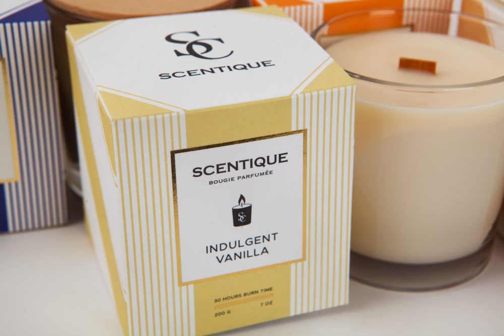 Scentique's Elegant Candle Packaging By The Offset Group