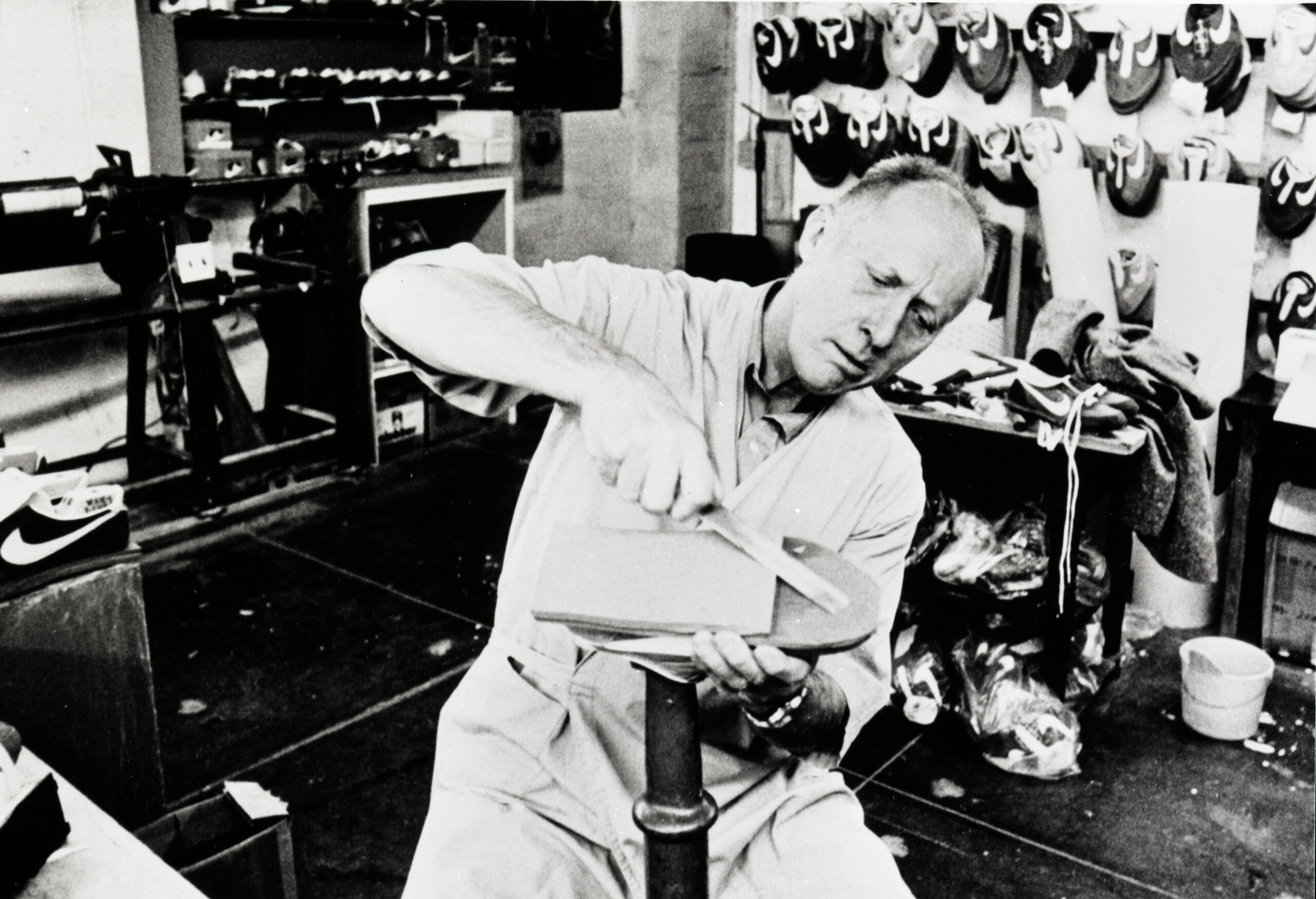 Publicity shot of Bill Bowerman in his workshop at the Eugene Lab, 1980 © Nike, Inc.