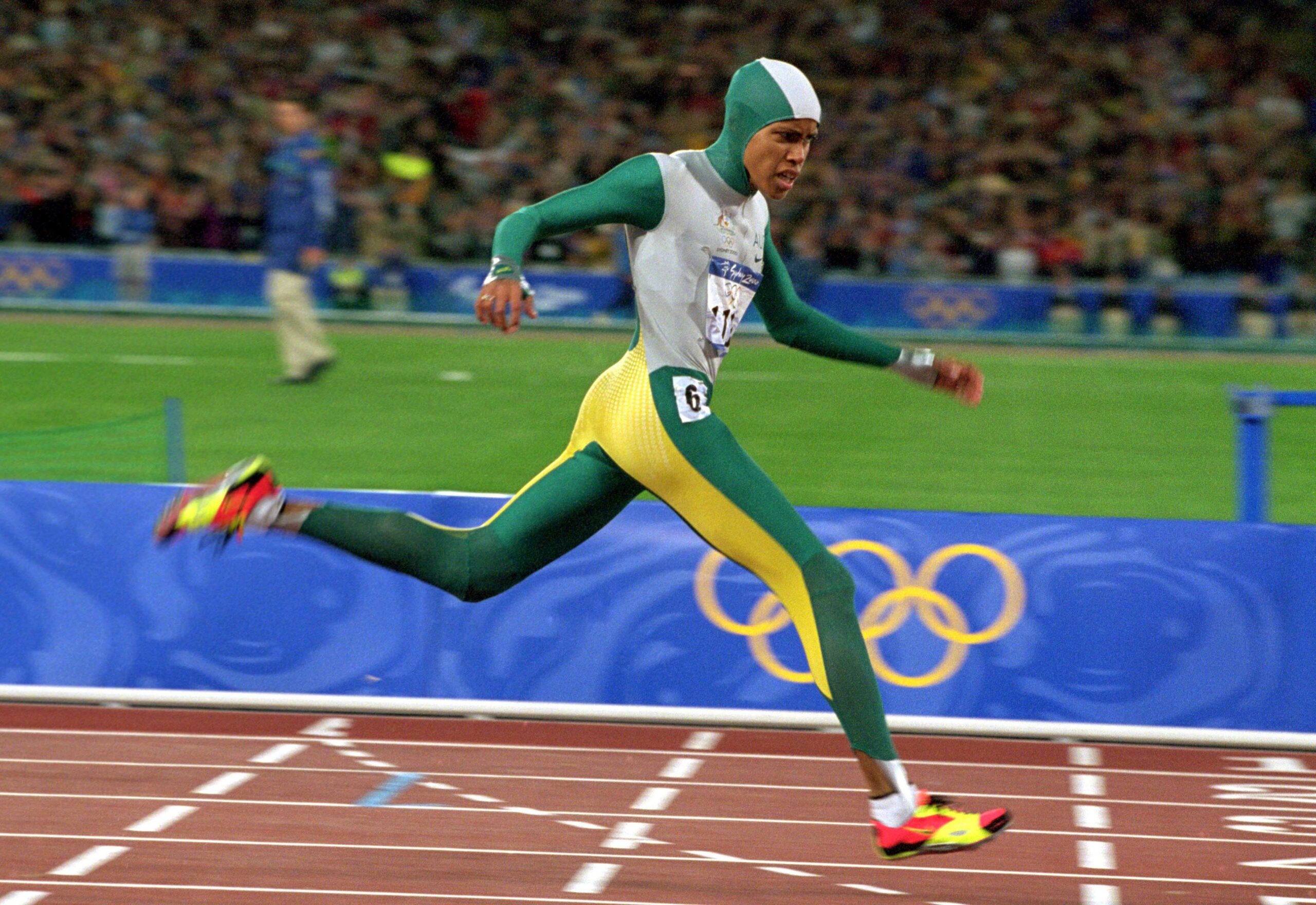 Cathy Freeman winning gold in the Women’s 400m Final at the Olympic Games in Sydney, 2000 © Getty Images, photo: Billy Stickland/Allsport*